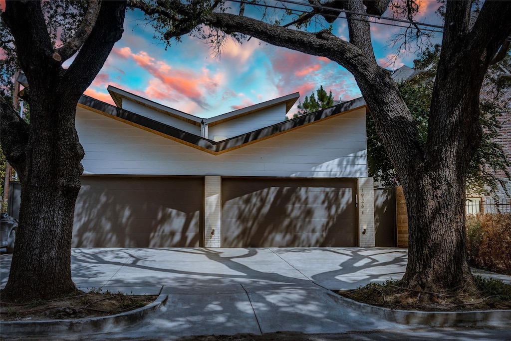 view of property exterior at dusk