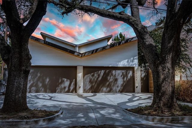 view of property exterior at dusk