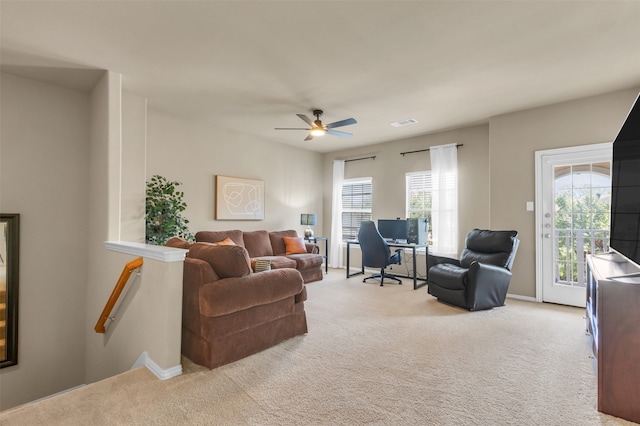 office with ceiling fan and light colored carpet