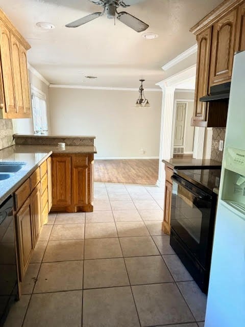 kitchen with light tile patterned floors, black appliances, crown molding, decorative light fixtures, and extractor fan