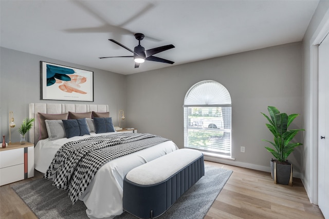 bedroom featuring ceiling fan and light hardwood / wood-style flooring