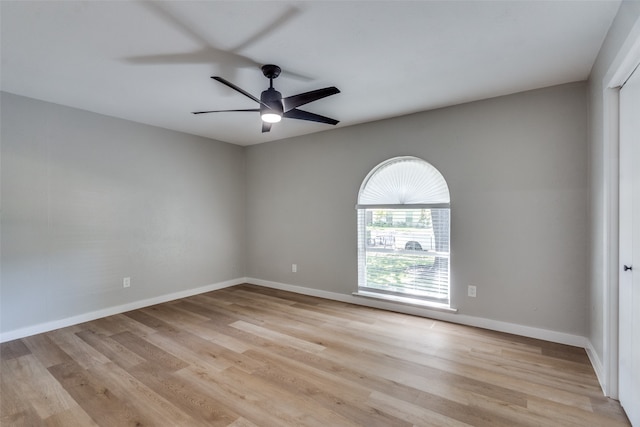 spare room featuring ceiling fan and light hardwood / wood-style flooring