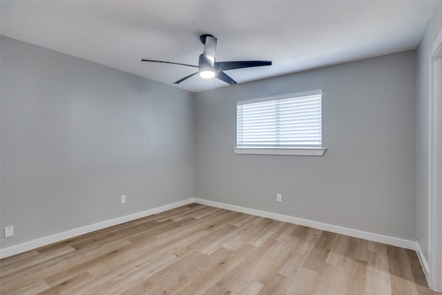 empty room with light hardwood / wood-style floors and ceiling fan