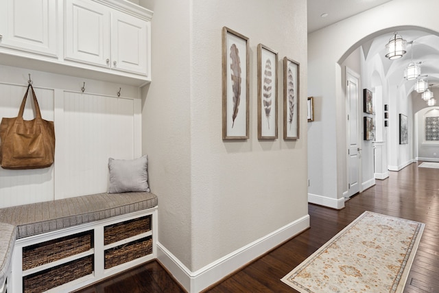 mudroom featuring dark wood-type flooring