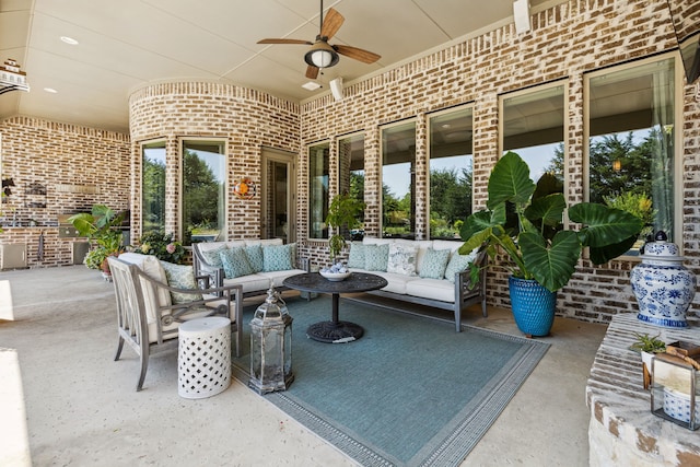 view of patio / terrace featuring ceiling fan and an outdoor hangout area