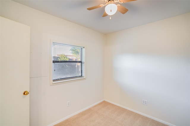 carpeted empty room with ceiling fan