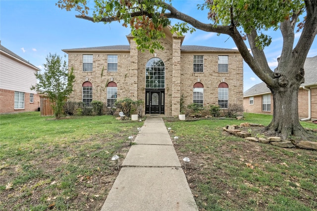 view of front of property with a front lawn