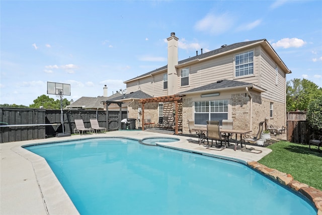 view of swimming pool featuring a patio