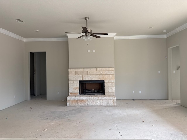 unfurnished living room with ceiling fan, a stone fireplace, and ornamental molding