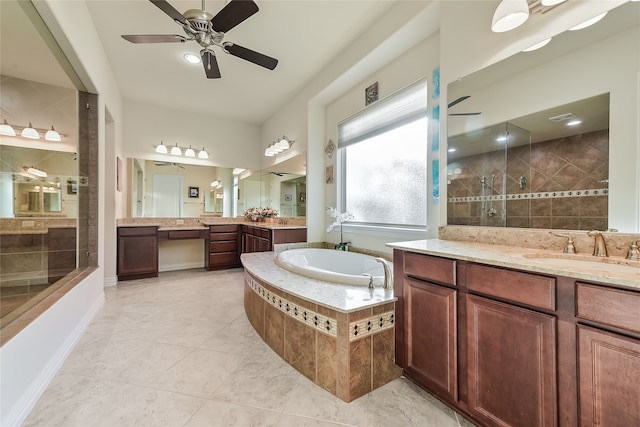 bathroom with vanity and independent shower and bath