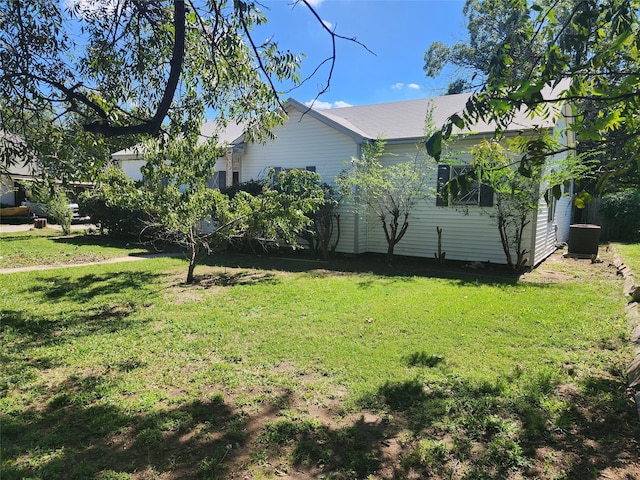 view of yard featuring central AC