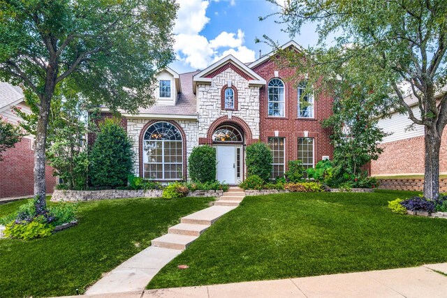 view of front of home with a front yard