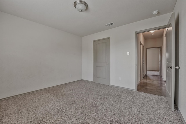 unfurnished bedroom with carpet