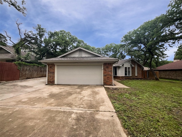 409 Misty Oaks St, Azle, TX 76020 - view of front of home featuring brick siding, concrete driveway, and an attached garage