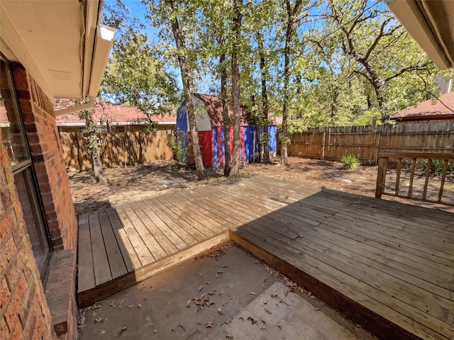 deck with a storage shed