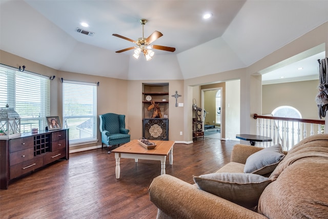 living room with vaulted ceiling, ceiling fan, and dark hardwood / wood-style flooring