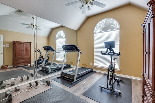 exercise area with light wood-type flooring, lofted ceiling, and ceiling fan