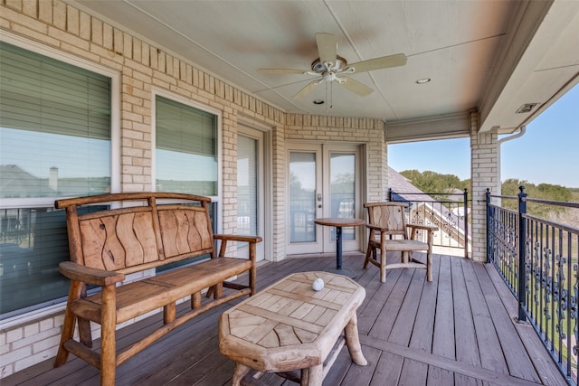 wooden terrace with ceiling fan