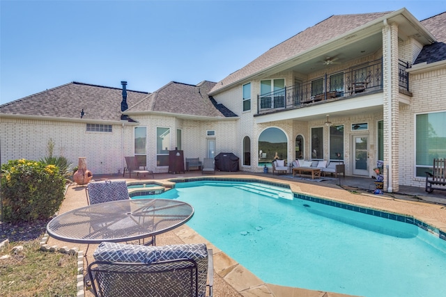 view of pool featuring a patio and an outdoor hangout area