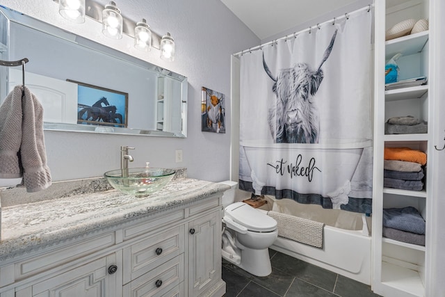 full bathroom featuring tile patterned flooring, shower / tub combo, vanity, and toilet