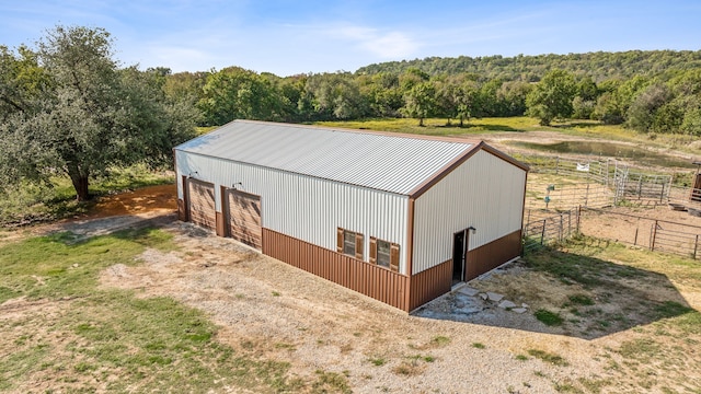 view of outdoor structure featuring a garage