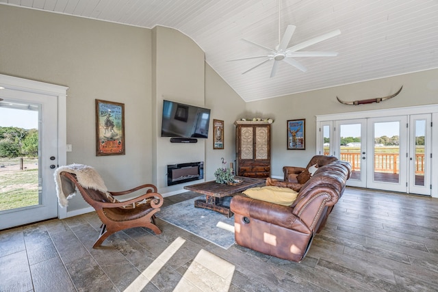 living room with ceiling fan, dark hardwood / wood-style floors, wood ceiling, french doors, and high vaulted ceiling