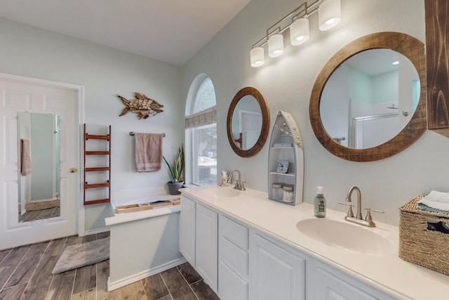 bathroom featuring vanity and walk in shower