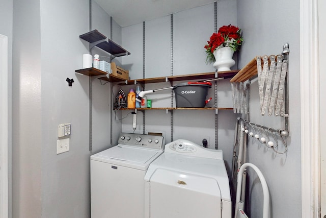 washroom with separate washer and dryer