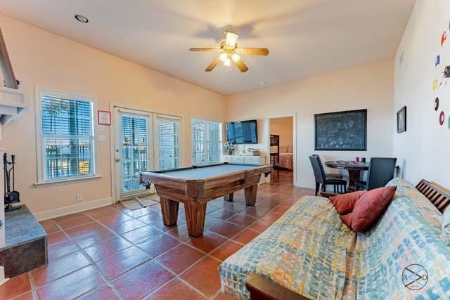 recreation room with ceiling fan, billiards, and tile patterned flooring