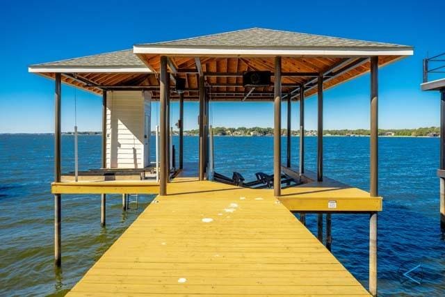 view of dock with a water view