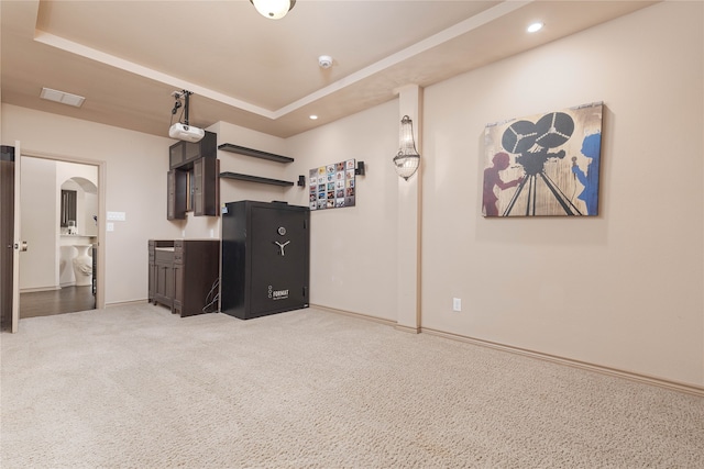 interior space with a tray ceiling