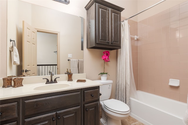 full bathroom featuring shower / bath combo, vanity, tile patterned flooring, and toilet