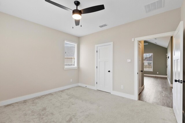 washroom featuring dark hardwood / wood-style floors, sink, and electric dryer hookup