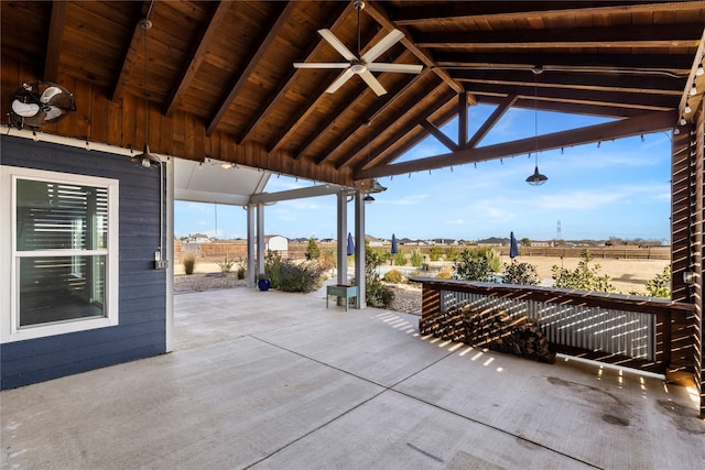 view of patio / terrace featuring a gazebo and ceiling fan