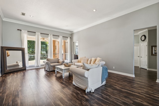 living room with dark hardwood / wood-style flooring and ornamental molding