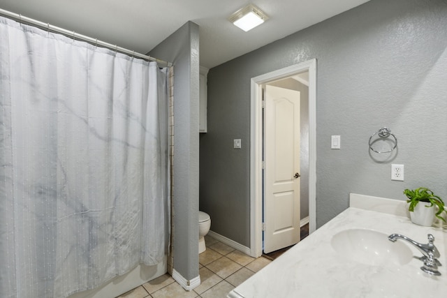 full bathroom featuring shower / bath combo, tile patterned floors, vanity, and toilet