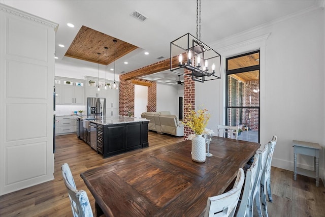 14098 County Road 2858, Eustace, TX 75124 - dining room with recessed lighting, visible vents, dark wood-style floors, and ceiling fan with notable chandelier