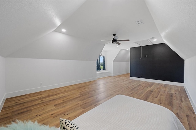 14098 County Road 2858, Eustace, TX 75124 - additional living space with baseboards, vaulted ceiling, and light wood-type flooring