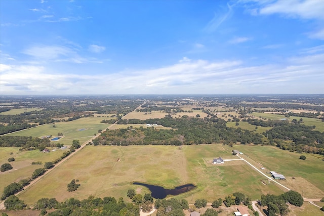 birds eye view of property featuring a rural view