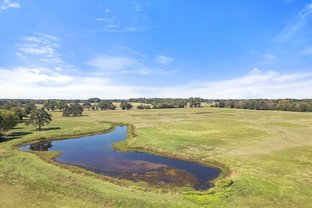 surrounding community featuring a water view