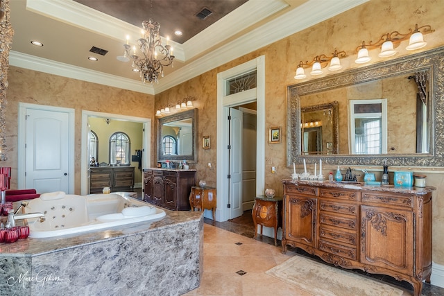 bathroom with an inviting chandelier, ornamental molding, vanity, tiled bath, and tile patterned flooring