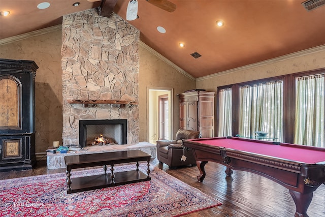 playroom featuring crown molding, a stone fireplace, wood-type flooring, and pool table