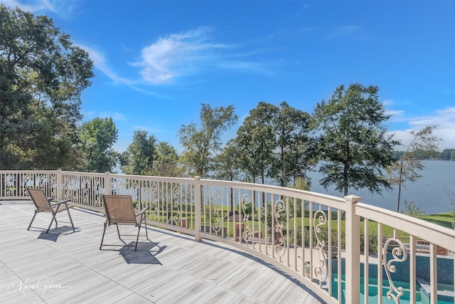 deck featuring a water view