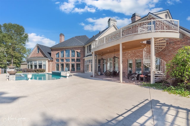 back of house featuring a patio area