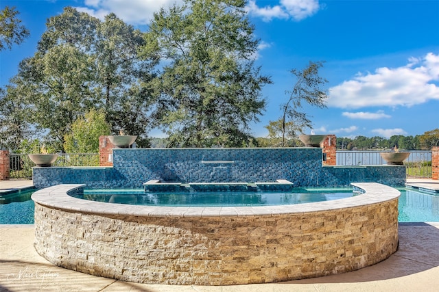 view of property's community with a pool