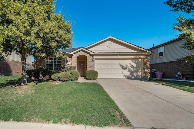 ranch-style home featuring a front lawn and a garage