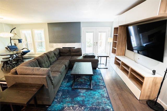 living room featuring french doors and dark hardwood / wood-style floors