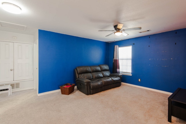 walk in closet with carpet