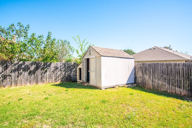 view of outdoor structure with a lawn