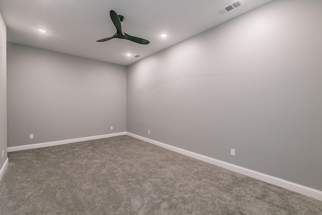 empty room with recessed lighting, ceiling fan, visible vents, dark carpet, and baseboards